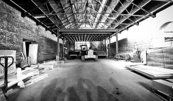 Black and white interior of The Engine Shed under construction