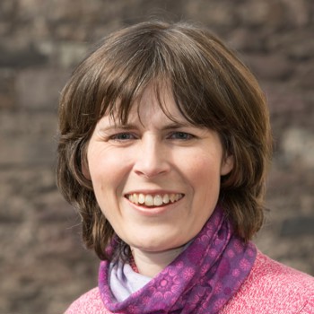 A portrait photo of Sarah Hamilton smiling