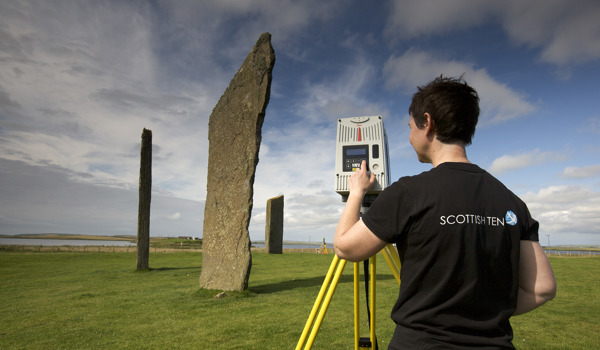 A person laser scanning a historic stone in Orkney